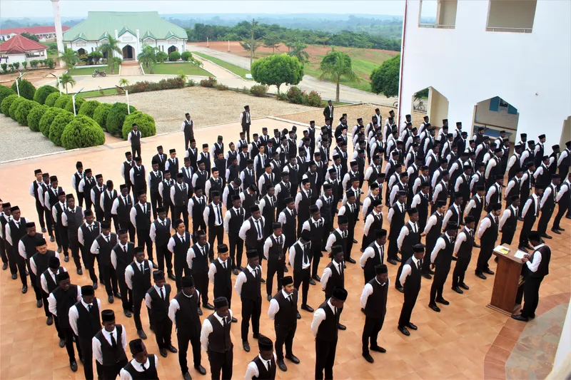 Jamia Ahmadiyya Ghana students gathered for assembly in the courtyard